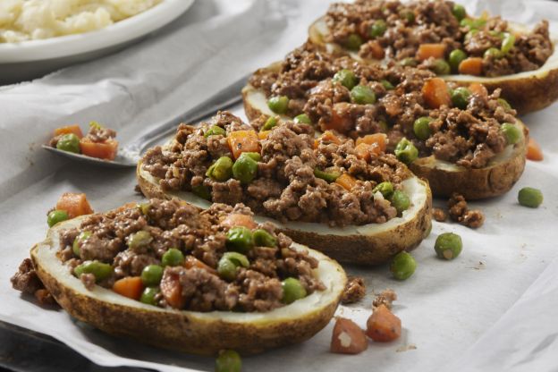 Patate al ragù con piselli e carote